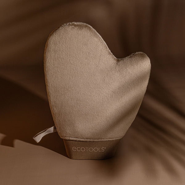 Taupe tanning mitt with soft fabric surface and terry cuff