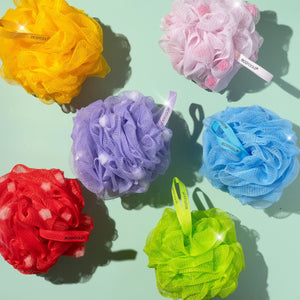 Delicate EcoPouf mesh cleansing puff assortment: yellow, pink, purple, blue, red, green