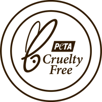 Brown circular stamp logo with cursive text reading PETA Cruelty Free and a leaf-like symbol