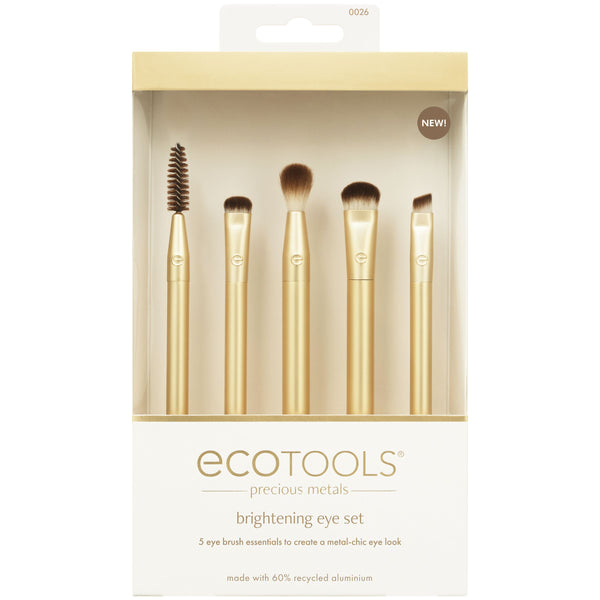Boxed brightening eye brush set with five gold brushes and dark brown bristles.