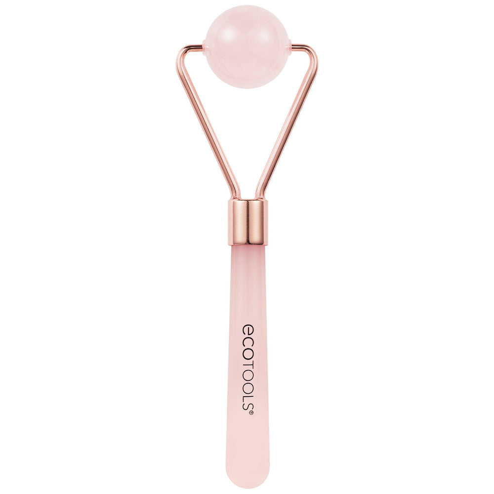 Rose quartz facial roller with round pink stone head and rose-gold metal frame, pink handle