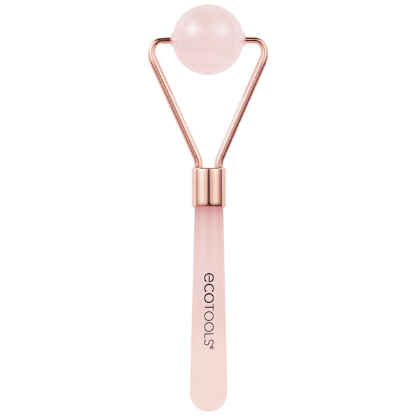 Rose quartz facial roller with round pink stone head and rose-gold metal frame, pink handle