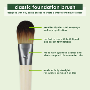 Foundation brush with dark bristles and bamboo handle shown upright