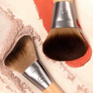 Natural blush and highlight duo brush heads with soft brown bristles on matte silver handles