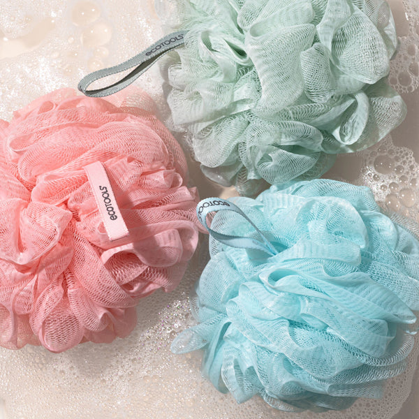 Set of mesh EcoPoufs: pink, mint, and light blue ruffled scrubber puffs