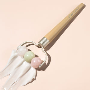 Three-stone roller with pale bamboo handle, U-frame and pink, green, white stones