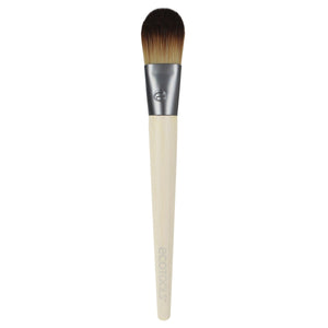 Foundation makeup brush with dark bristles and light bamboo handle