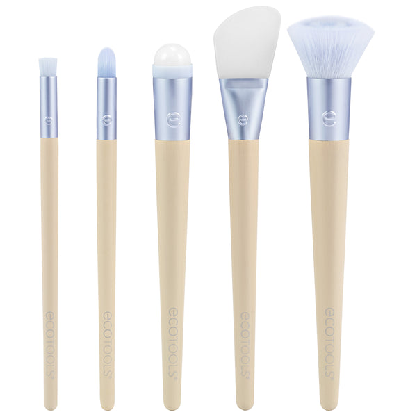 Skincare brush kit with five blue-and-cream handles and soft white bristles.