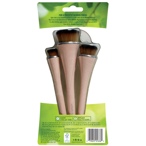 Three makeup brushes in a retail backer, pink handles with black ferrules and brown bristles