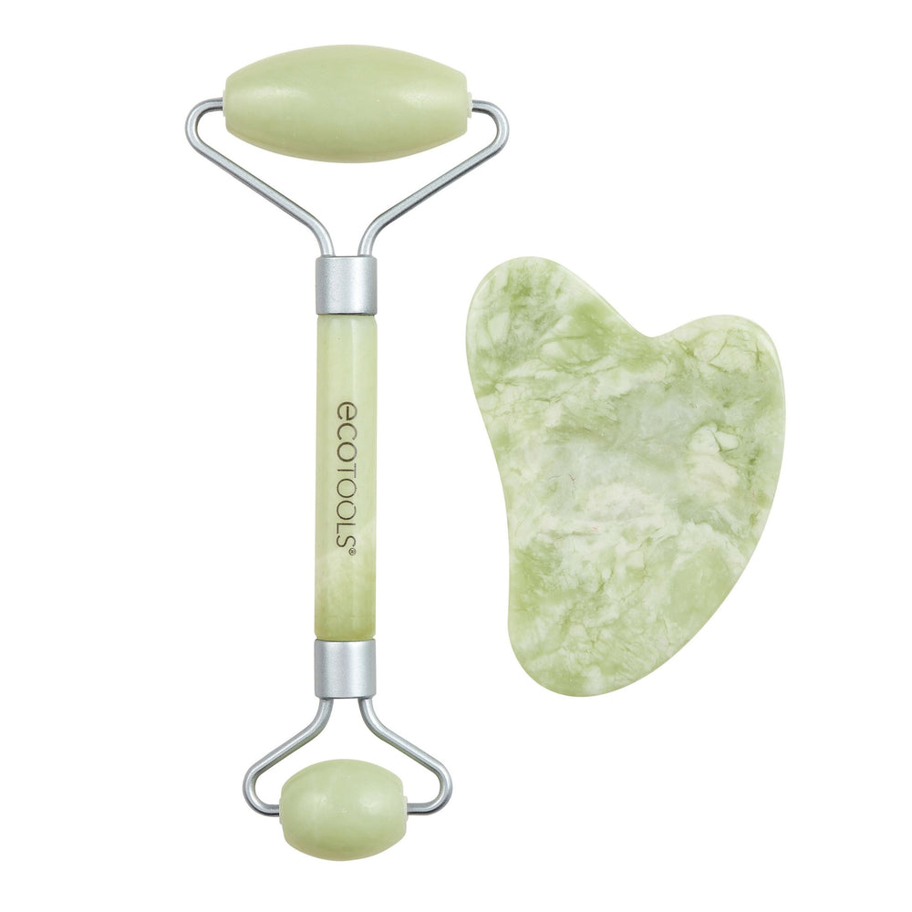 Jade-green facial roller with stainless steel handles and a gua sha stone