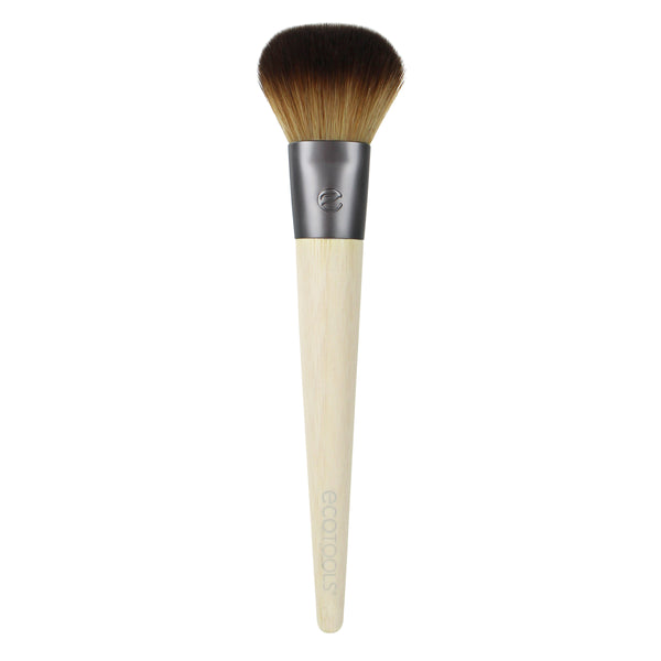 Blush makeup brush with dark tapered bristles and light bamboo handle
