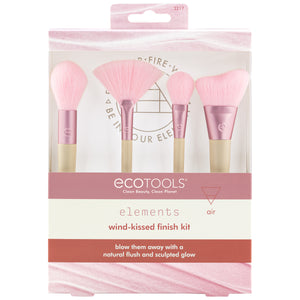 Makeup brush kit in clear packaging showing four pink bristle brushes with beige handles.