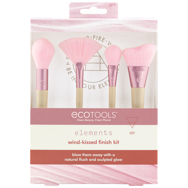 Makeup brush kit in clear packaging showing four pink bristle brushes with beige handles.