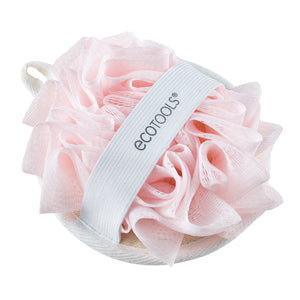 Pink loofah cleansing pad with light gray ecotools strap and hanging loop.