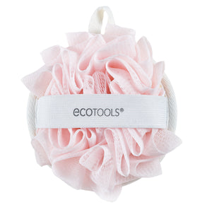 Pink dual cleansing pad with fluffy loofah mesh, round shape, and hanging loop.