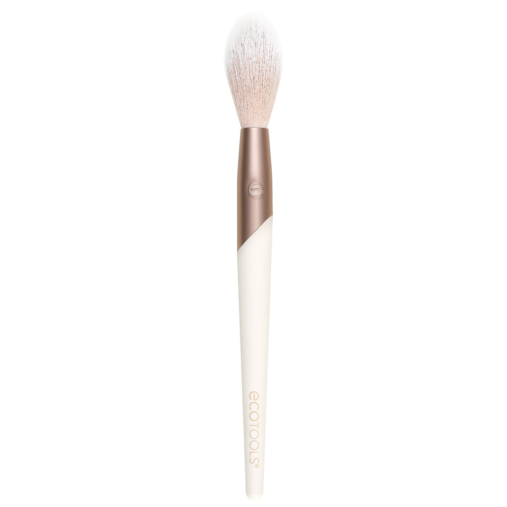 Soft highlight makeup brush with white bristles and rose-gold handle