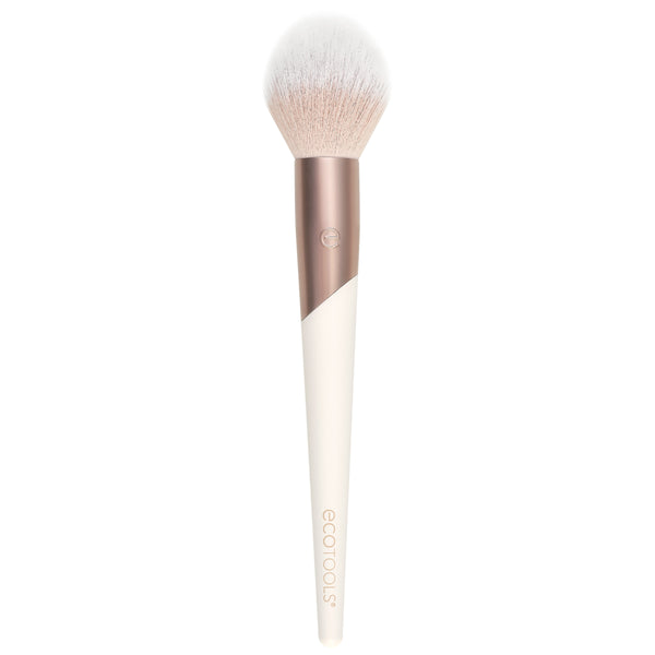 Plush powder makeup brush with soft white bristles and rose-and-cream handle