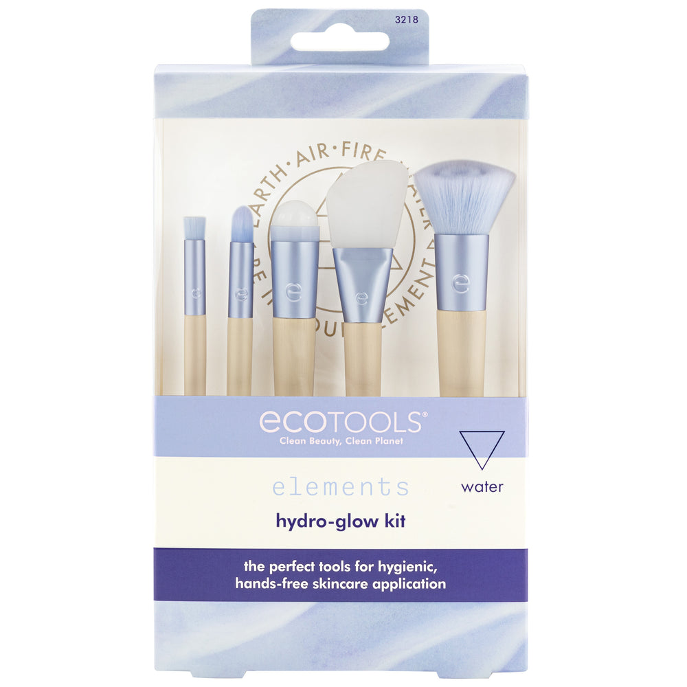 Skincare brush kit with five blue-and-cream handles and soft white bristles.