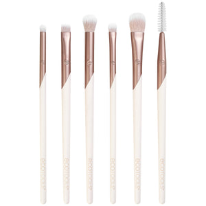 Eye brush set with rose-gold handles and white bristles, including spoolie brush